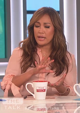 Carrie’s pink tie cuff blouse on The Talk