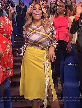 Wendy’s plaid sweater and yellow fringe skirt on The Wendy Williams Show