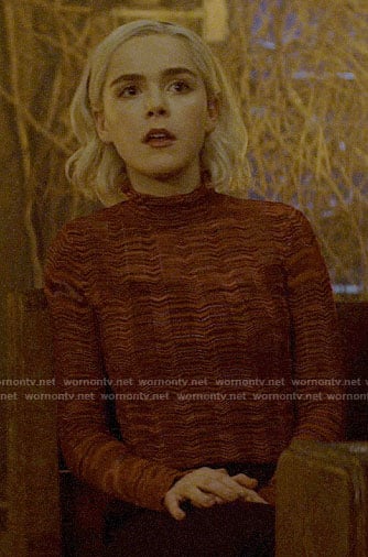 Sabrina’s red marled mock neck sweater on Chilling Adventures of Sabrina