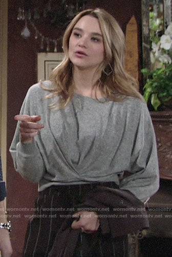 Summer’s grey twist front sweater and striped pants on The Young and the Restless