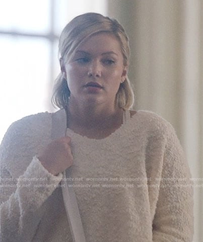 Tandy’s white textured crop sweater on Cloak and Dagger