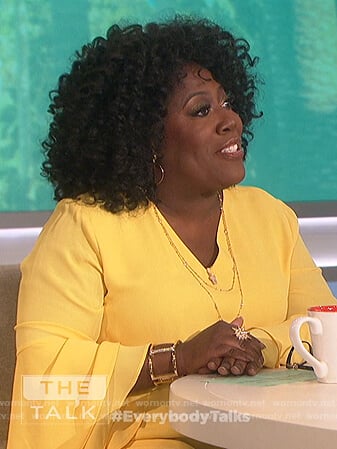 Sheryl’s yellow bell sleeve top on The Talk