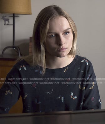 Elle's black butterfly print sweater on The Society