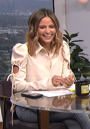 Erin’s white cutout tie sleeve blouse on E! News Daily Pop