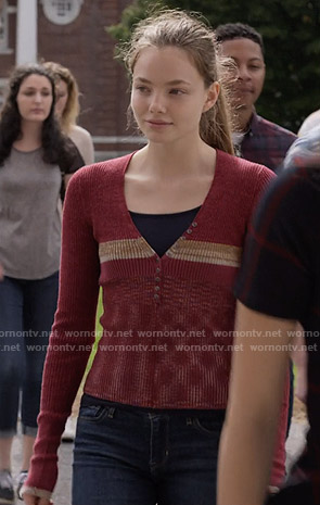 Kelly’s red ribbed v-neck top on The Society