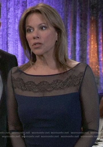 Alexis’s navy embroidered mesh sleeve gown at the Nurse’s Ball on General Hospital