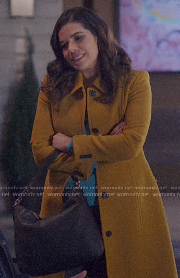 Amy's mustard coat on Superstore