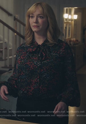 Beth’s black floral tie neck blouse on Good Girls