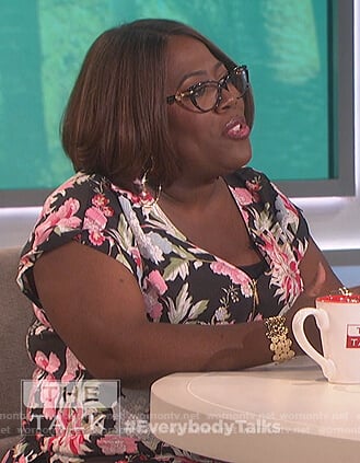 Sheryl’s floral zip down top on The Talk