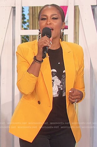 Eve’s yellow blazer and print tee on The Talk