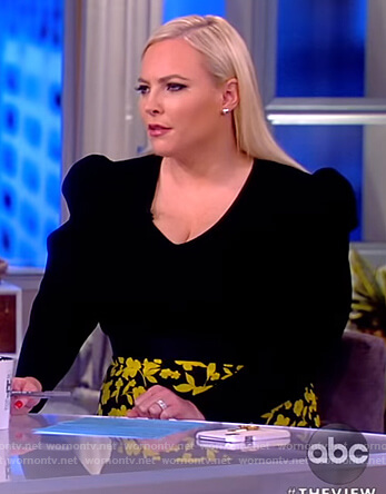 Meghan’s black puff sleeve sweater and skirt on The View