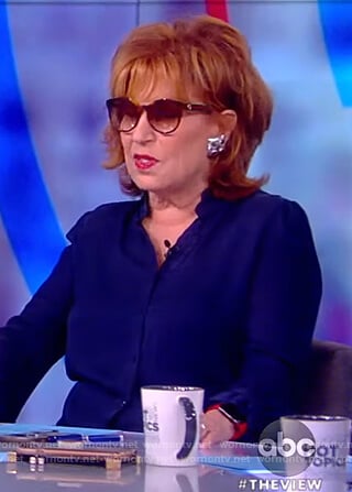 Joy’s navy ruffle neck blouse on The View