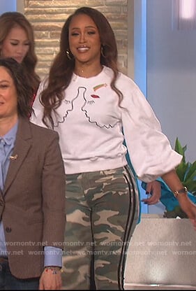 Eve’s embroidered sweater and camo pants on The Talk