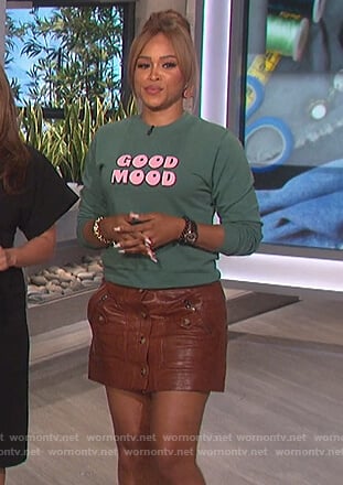 Eve’s green Good Mood sweater on The Talk