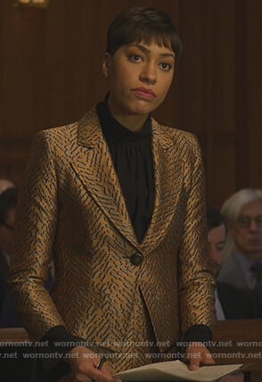 Lucca’s metallic blazer and skirt on The Good Fight