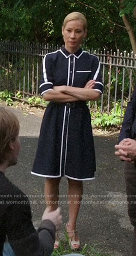 Joan's navy shirtdress with white trim on Elementary