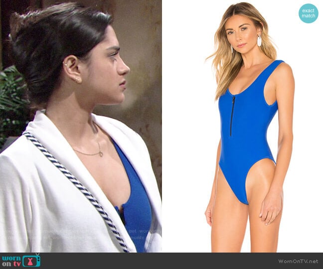 WornOnTV Lola s blue zip front swimsuit and striped trim robe on