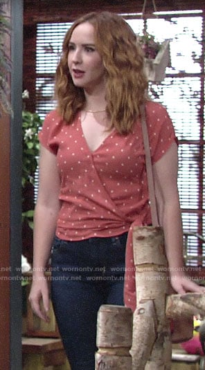 Mariah’s orange polka dot wrap top on The Young and the Restless