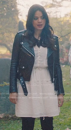 Mel’s white tie-waist dress and leather jacket on Charmed