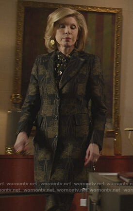 Diane's brown check coat and blouse on The Good Fight