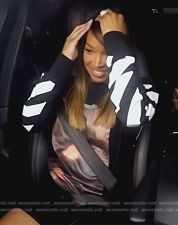 Malika’s Mona Lisa print sweatshirt on Keeping Up with the Kardashians