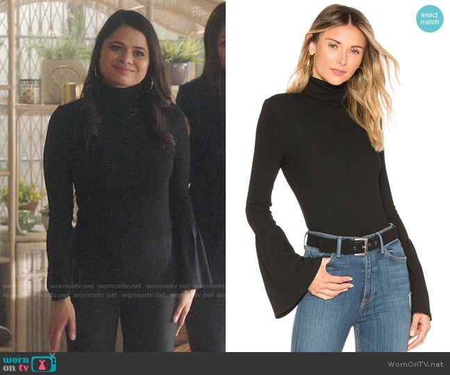 Paige Kenzie Sweater worn by Mel Vera (Melonie Diaz) on Charmed