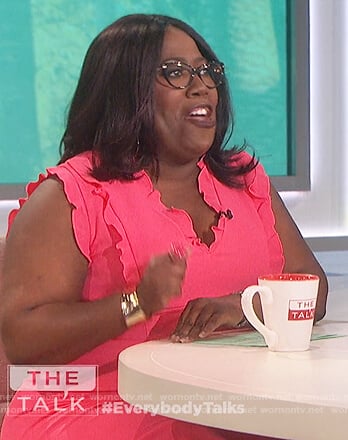 Sheryl’s pink ruffle trim dress on The Talk