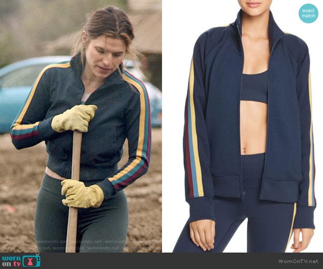 Spiritual Gangster Striped-Sleeve Track Jacket worn by Rio (Lake Bell) on Bless This Mess