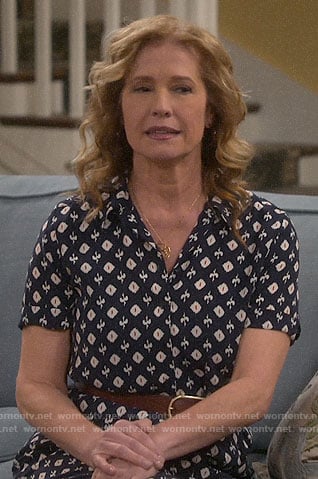 Vanessa’s navy ikat print shirtdress on Last Man Standing