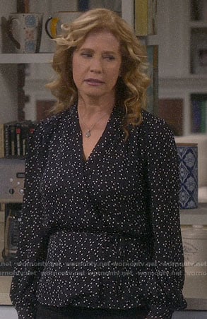 Vanessa’s black polka dot wrap top on Last Man Standing