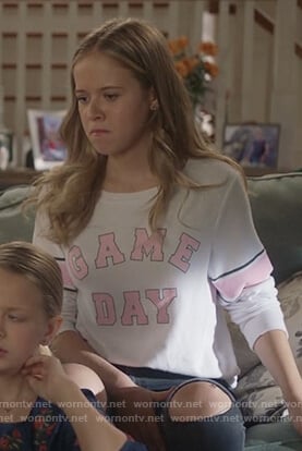 Sam’s white Game Day sweatshirt on Life in Pieces