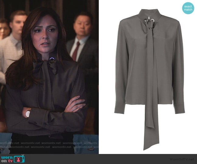 Emily’s gray tie neck blouse on Designated Survivor