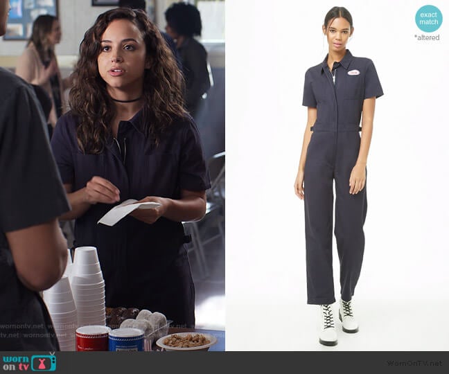 Patch Graphic Zip-Front Utility Jumpsuit by Urban Outfitters worn by Moe Truax (Kiana Madeira) on Trinkets