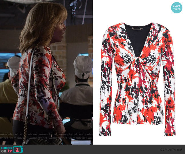 Twist-front printed stretch-jersey top by Roberto Cavalli worn by Dorothy Walker (Rebecca De Mornay) on Jessica Jones