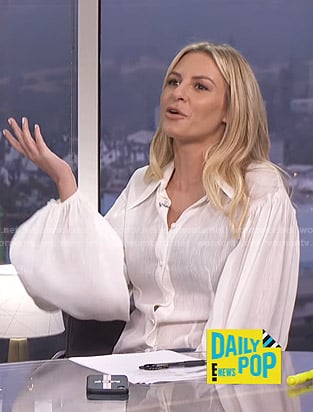 Morgan’s white bishop sleeve blouse on E! News Daily Pop