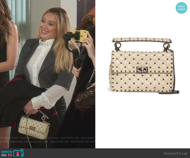 Medium Rockstud Matelassé Quilted Leather Crossbody Bag by Valentino worn by Kelsey Peters (Hilary Duff) on Younger