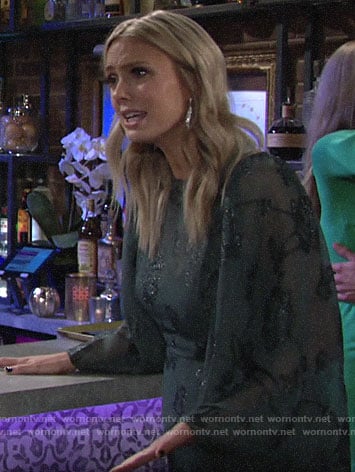 Abby’s green floral dress with sheer sleeves on The Young and the Restless