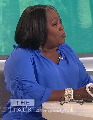 Sheryl’s blue ruched top on The Talk