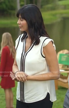 Cassie's white zip-front top on Good Witch