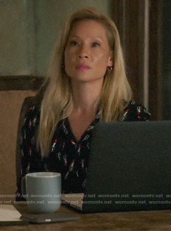 Joan's black lipstick print blouse on Elementary