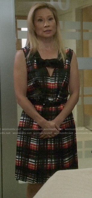 Joan's plaid dress with velvet bow on Elementary