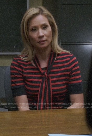 Joan’s red striped tie-neck top on Elementary