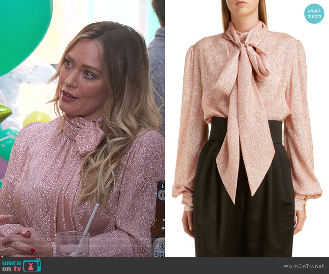 Tie Neck Lamé Blouse by Marc Jacobs worn by Kelsey Peters (Hilary Duff) on Younger