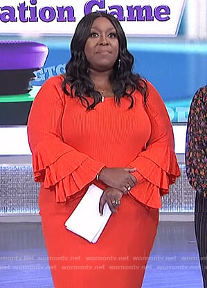 Loni’s orange bell sleeve dress on The Real