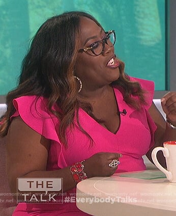 Sheryl’s pink ruffle v-neck sheath dress on The Talk