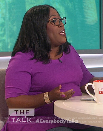 Sheryl’s purple peplum top on The Talk