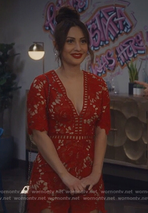 Ana's red floral lace romper on Grown-ish