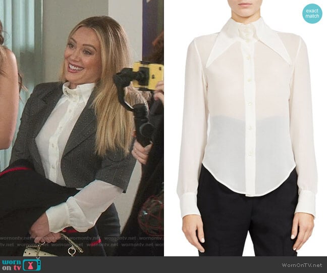 Oversized Collar Sheer Silk Button-Down Blouse by Saint Laurent worn by Kelsey Peters (Hilary Duff) on Younger