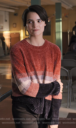 Elodie’s red striped velvet sweater on Trinkets