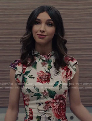 Alicia’s white floral dress with star buttons on Grand Hotel